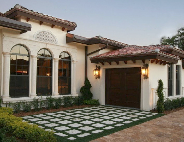 Royal Palm Yacht Club custom home front entry and driveway